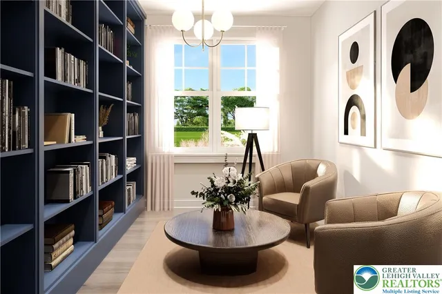 a living room with furniture and a chandelier