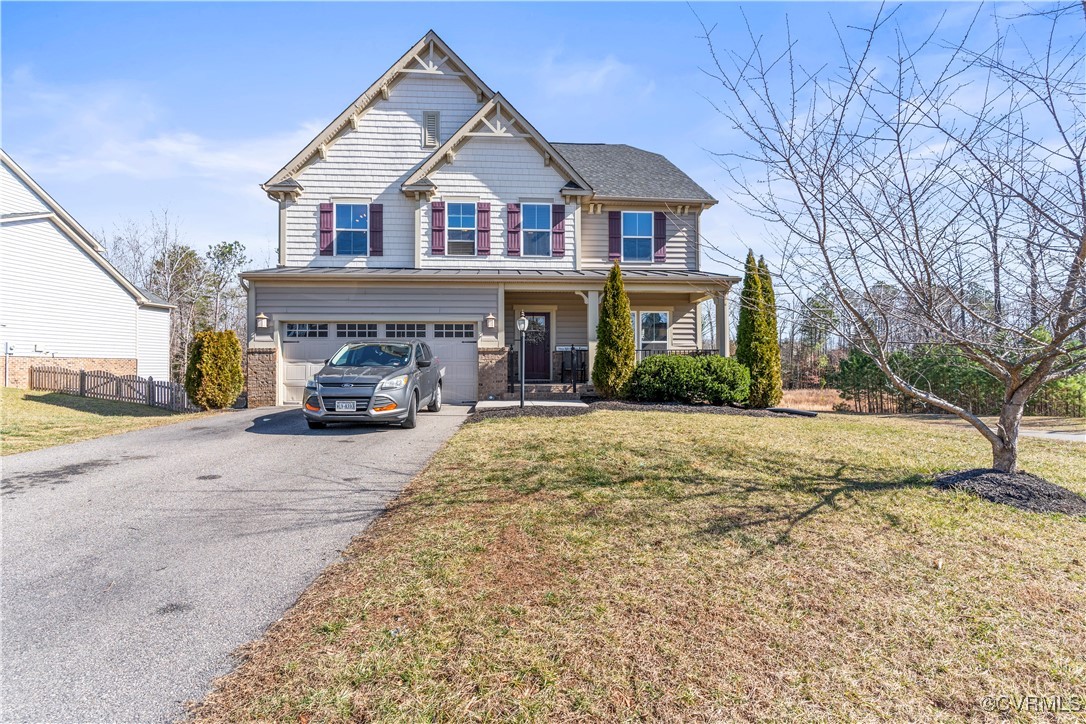 8825 Bailey Hill Road Midlothian, VA 23112 - Photo 1 of 1 View of front of home with a front lawn, a garage,