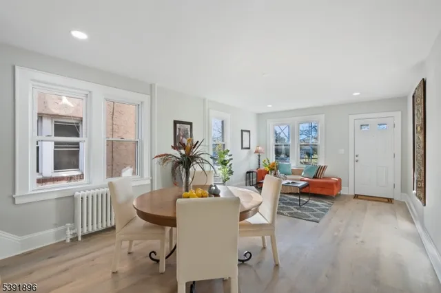 a view of a livingroom with furniture and a window