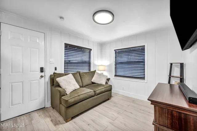 a kitchen with stainless steel appliances kitchen island granite countertop a stove and a microwave