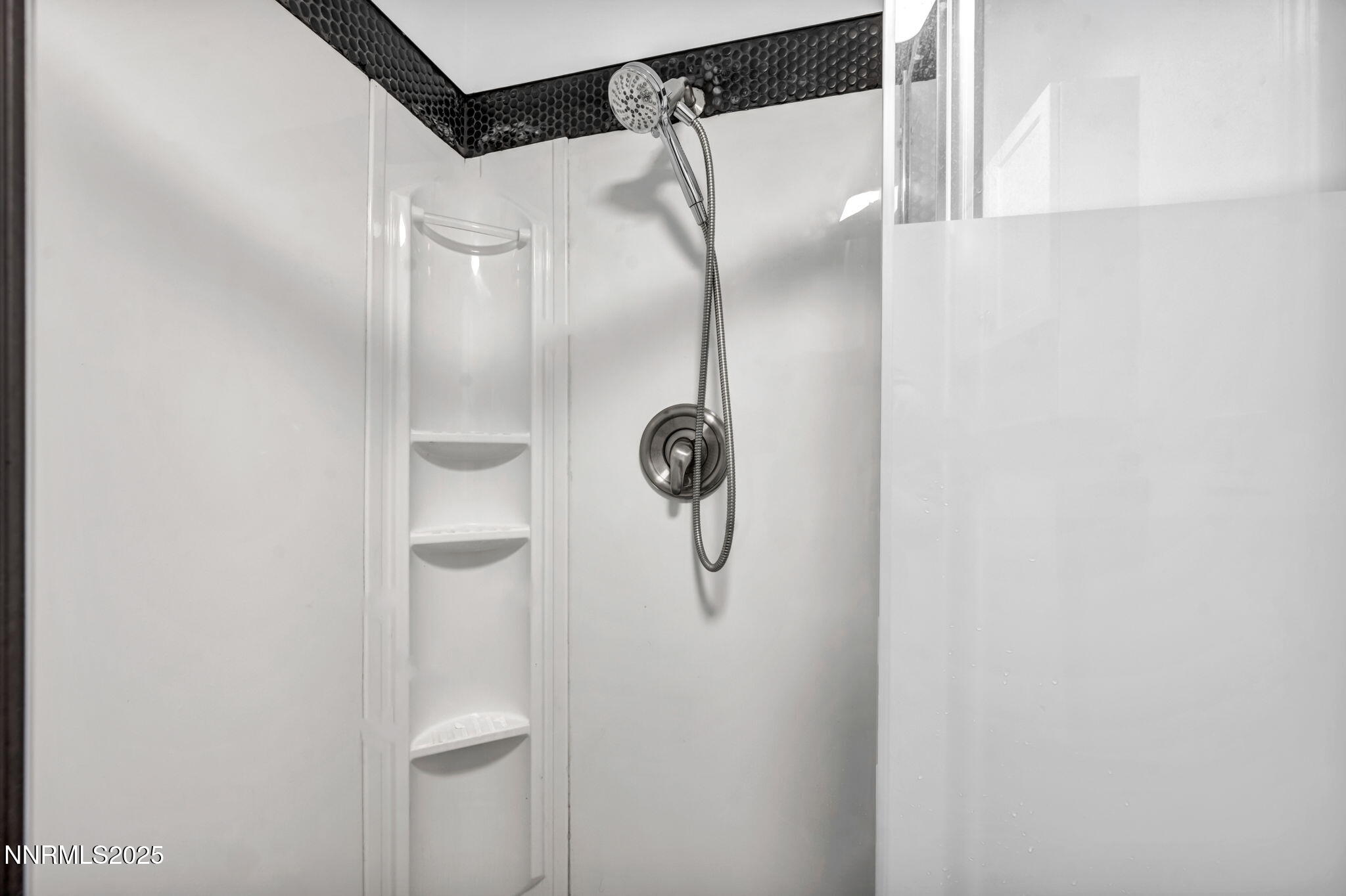 459 Field Street Sparks, NV 89431 - Photo 30 of 30 a bathroom with a glass shower door