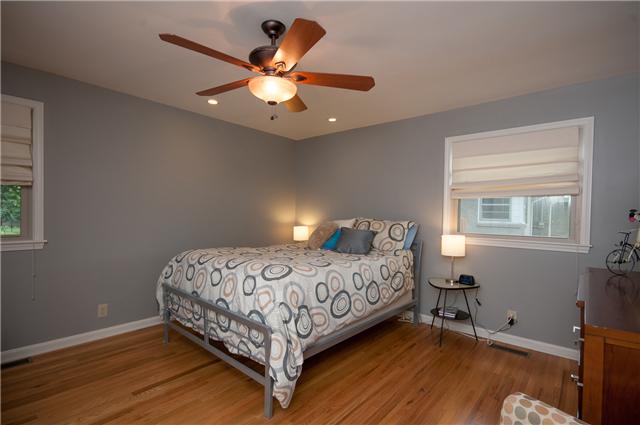 350 Stable Road Franklin, TN 37069 - Photo 9 of 18 Master Bedroom features Hardwood Floors, Ceiling Fan and Private Bath with heated tile floor.