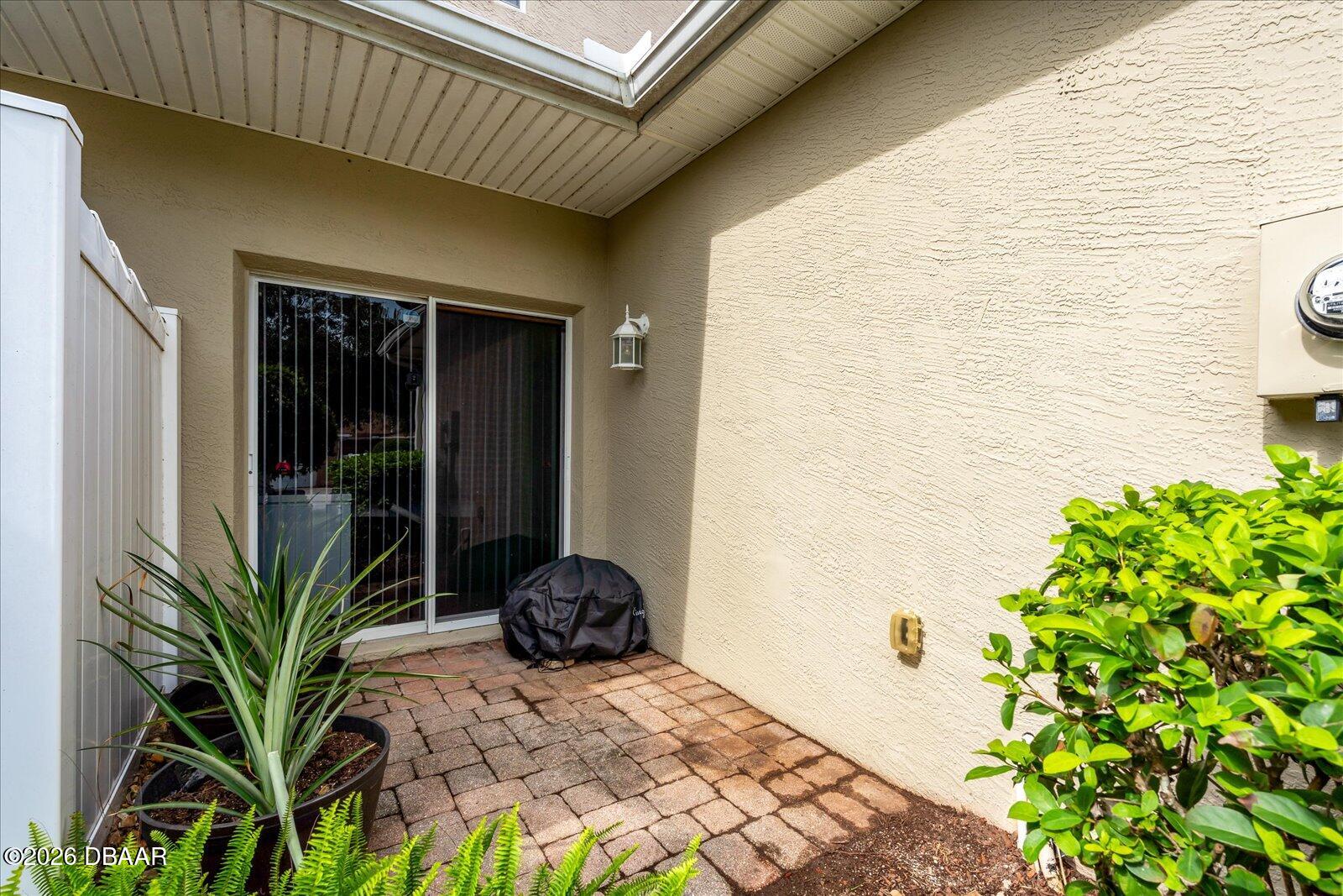 3617 Romea Circle New Smyrna Beach, FL 32168 - Photo 21 of 28 a front view of a house with a yard