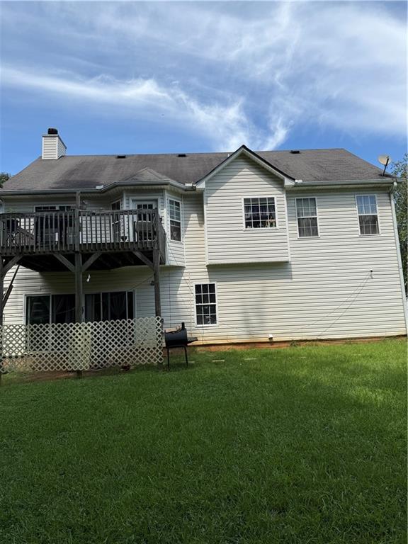 3903 Doe Run Drive Powder Springs, GA 30127 - Photo 11 of 60 a front view of a house with a yard
