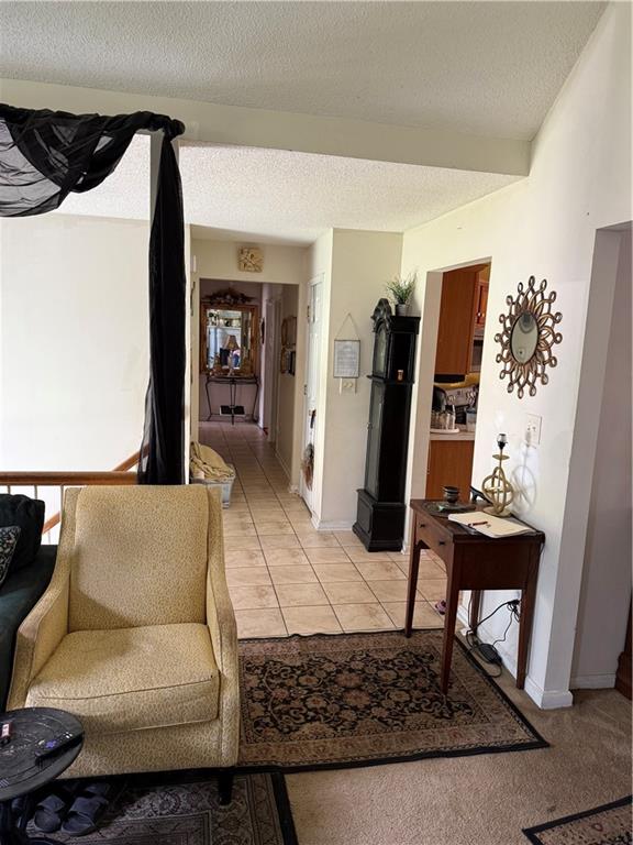 3903 Doe Run Drive Powder Springs, GA 30127 - Photo 13 of 60 a living room with furniture and a couch