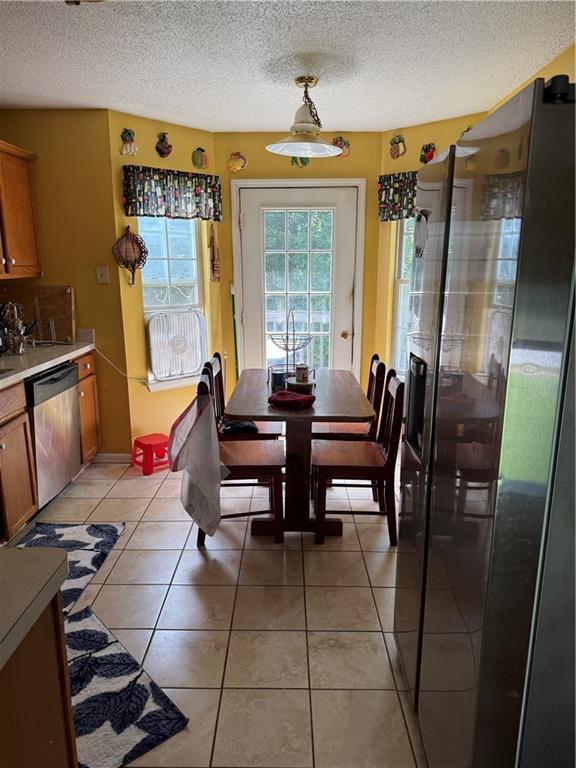 3903 Doe Run Drive Powder Springs, GA 30127 - Photo 18 of 60 a living room with blue lights furniture and a floor to ceiling window