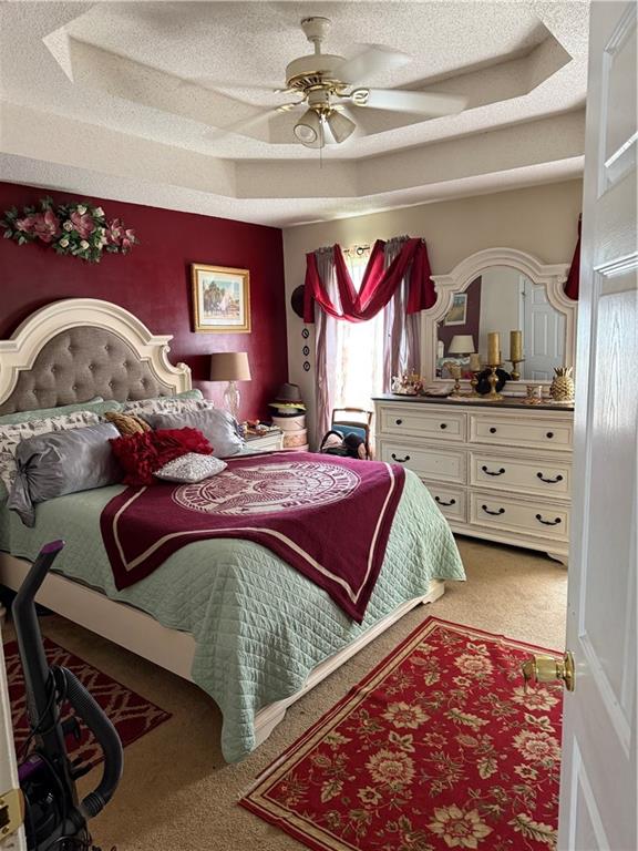 3903 Doe Run Drive Powder Springs, GA 30127 - Photo 34 of 60 a bedroom with a bed and dresser