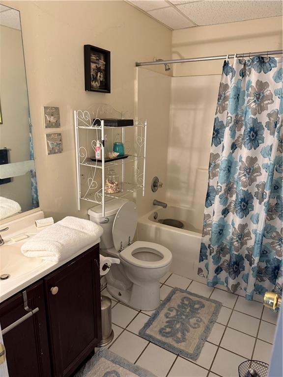 3903 Doe Run Drive Powder Springs, GA 30127 - Photo 49 of 60 a bathroom with a granite countertop sink toilet and shower