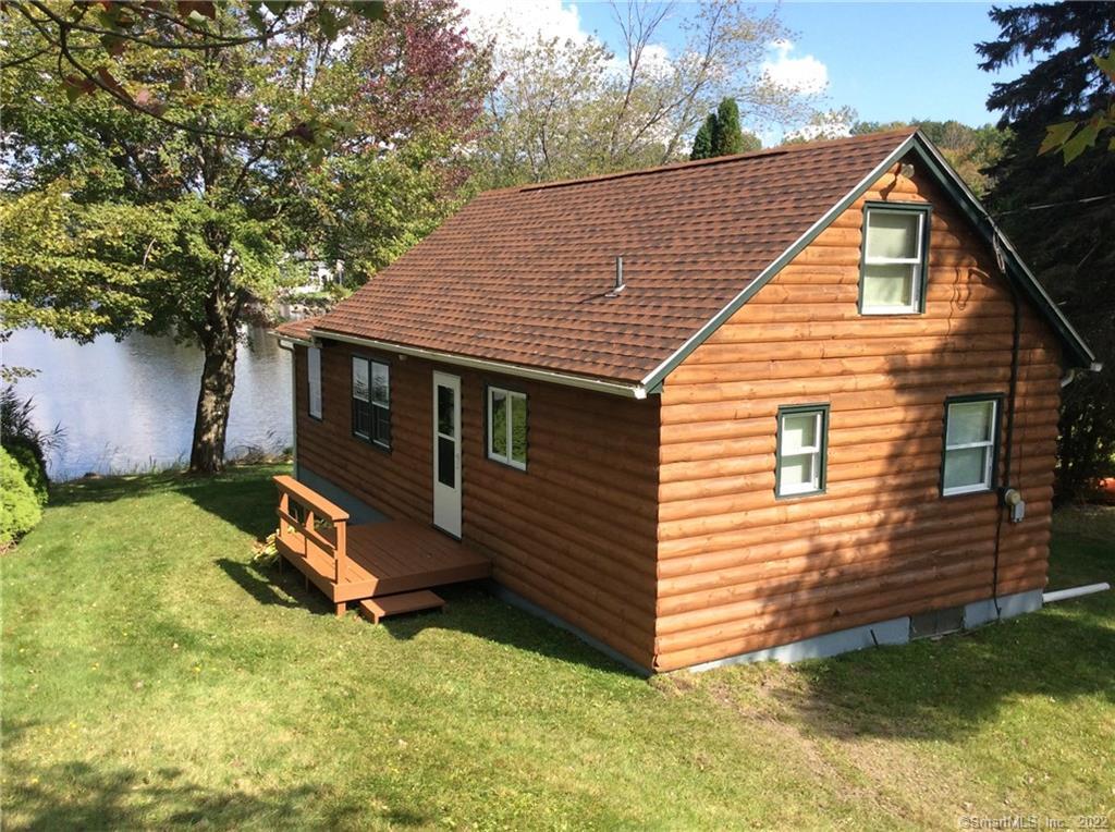 26 Flora Road Goshen, CT 06756 - Photo 1 of 1 a view of backyard with a small cabin