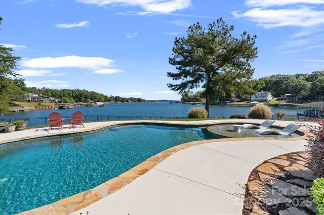 a view of a lake with a yard