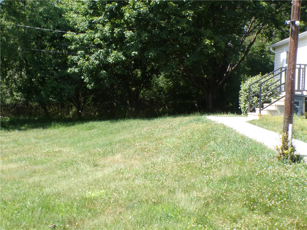 7877 Gun Club Road New Tripoli, PA 18066 - Photo 19 of 19 A verdant, open lawn provides a clear path to the home's welcoming entry.