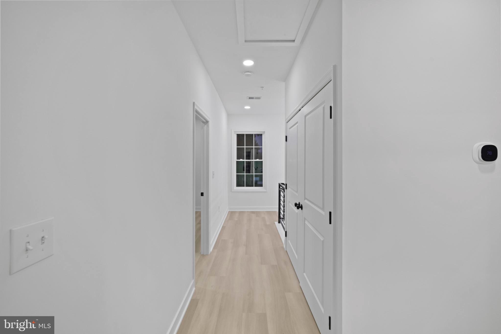 237 Brock Bridge Road Laurel, MD 20724 - Photo 31 of 64 a view of a hallway with wooden floor