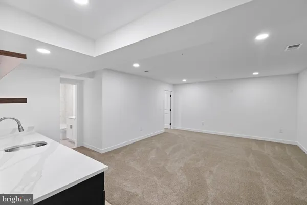 a view of a room with an empty space