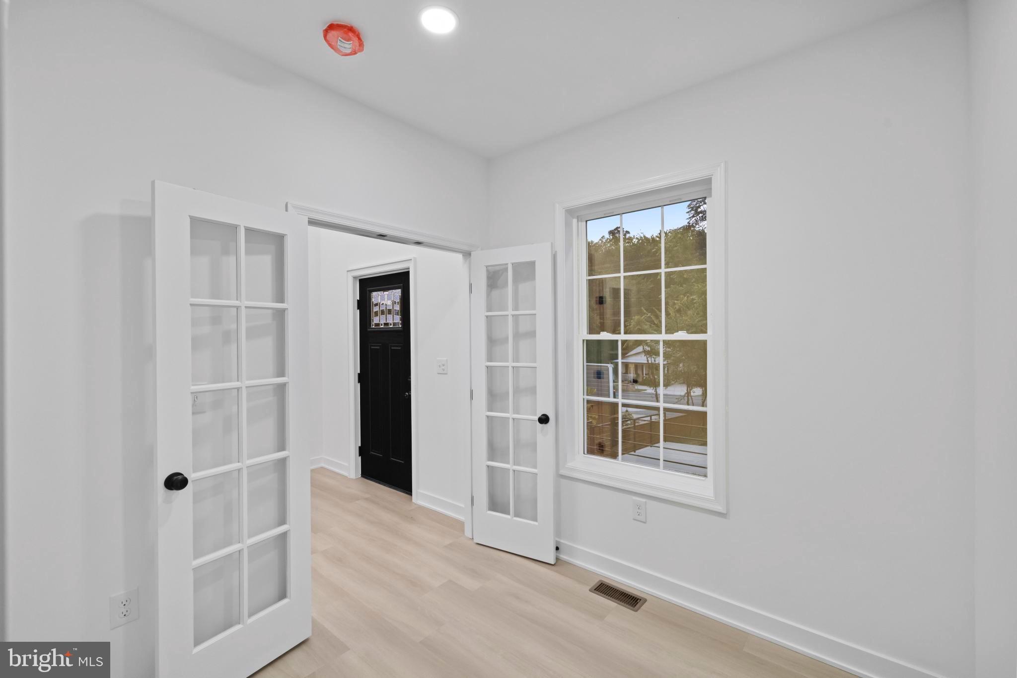 237 Brock Bridge Road Laurel, MD 20724 - Photo 47 of 64 an empty room with windows