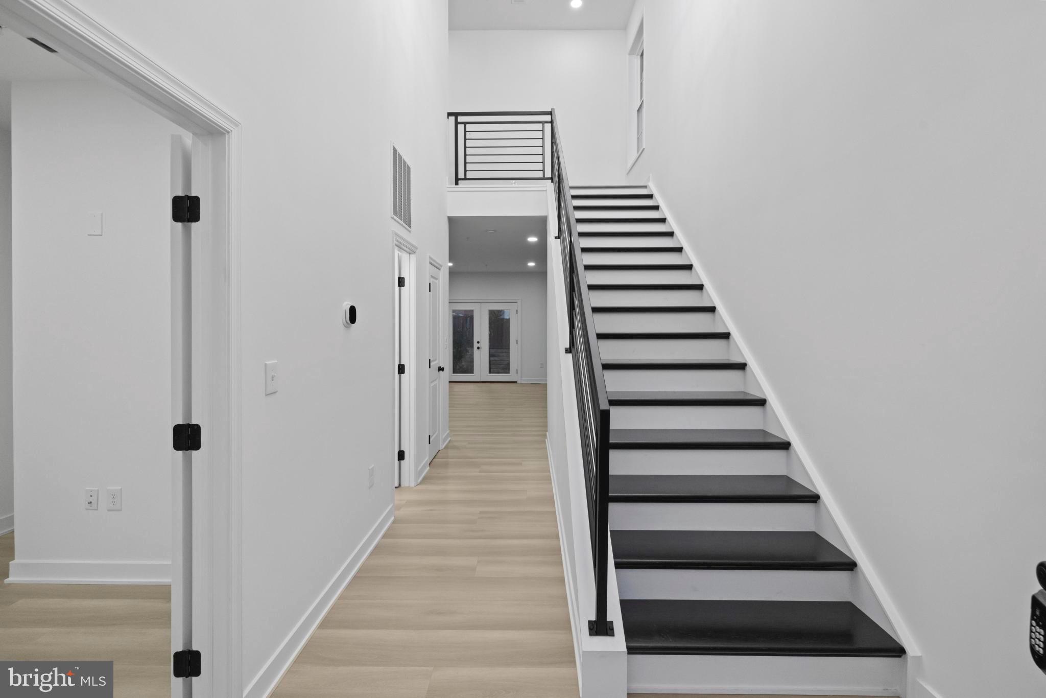 237 Brock Bridge Road Laurel, MD 20724 - Photo 49 of 64 a view of entryway and hall with wooden floor