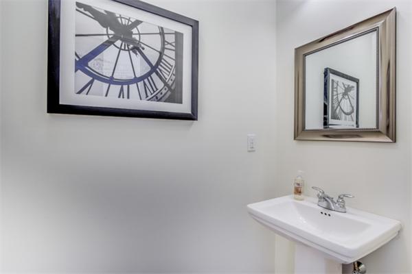 90 Rangeway Road, Unit 110 Billerica, MA 01862 - Photo 8 of 30 a bathroom with a sink and a mirror