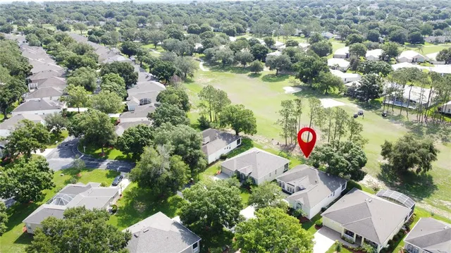 a outdoor space with lots of furniture and white walls