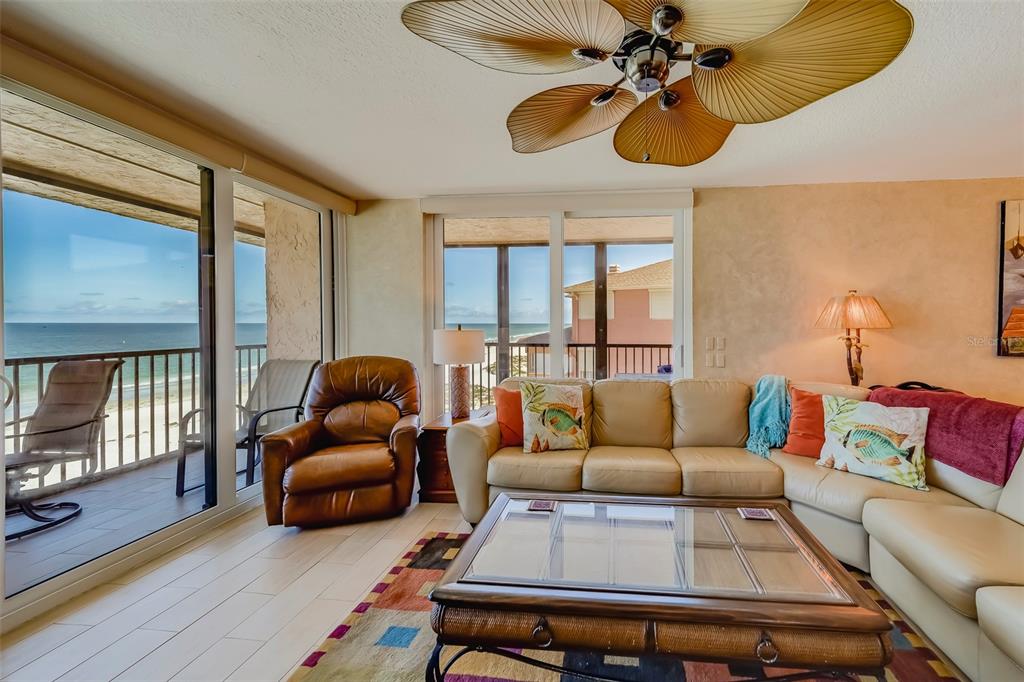 17580 Gulf Boulevard, Unit 412 Redington Shores, FL 33708 - Photo 11 of 67 a living room with furniture