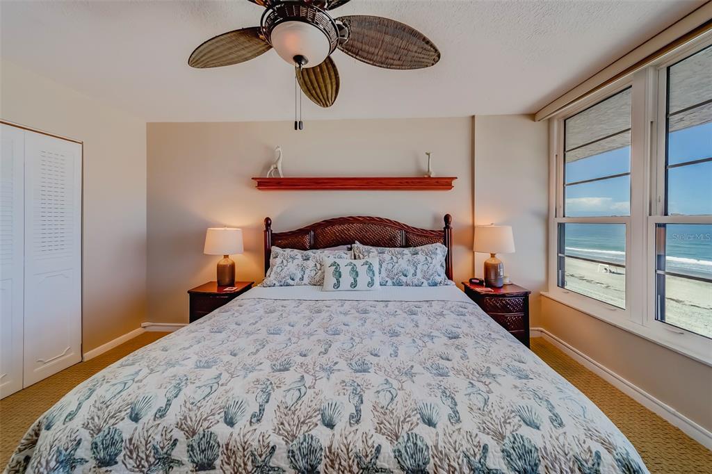 17580 Gulf Boulevard, Unit 412 Redington Shores, FL 33708 - Photo 27 of 67 a bedroom with a bed and window
