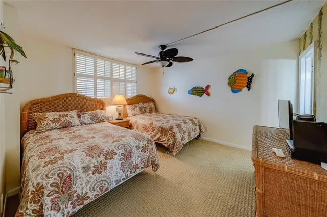 a bathroom with a sink vanity granite toilet and shower