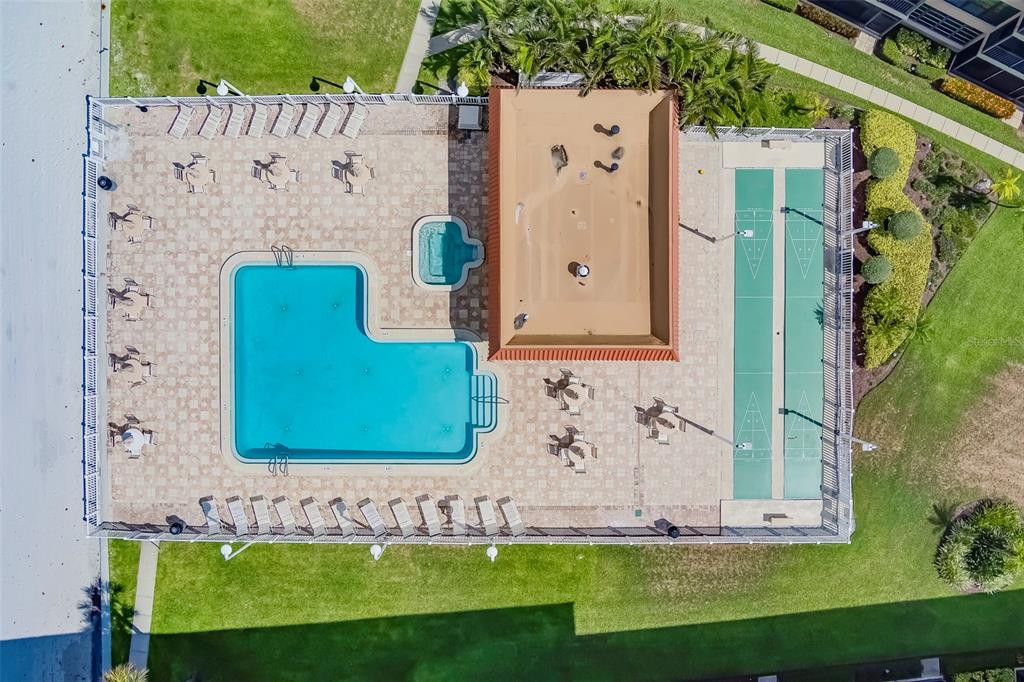 17580 Gulf Boulevard, Unit 412 Redington Shores, FL 33708 - Photo 66 of 67 aerial view of a house with garden