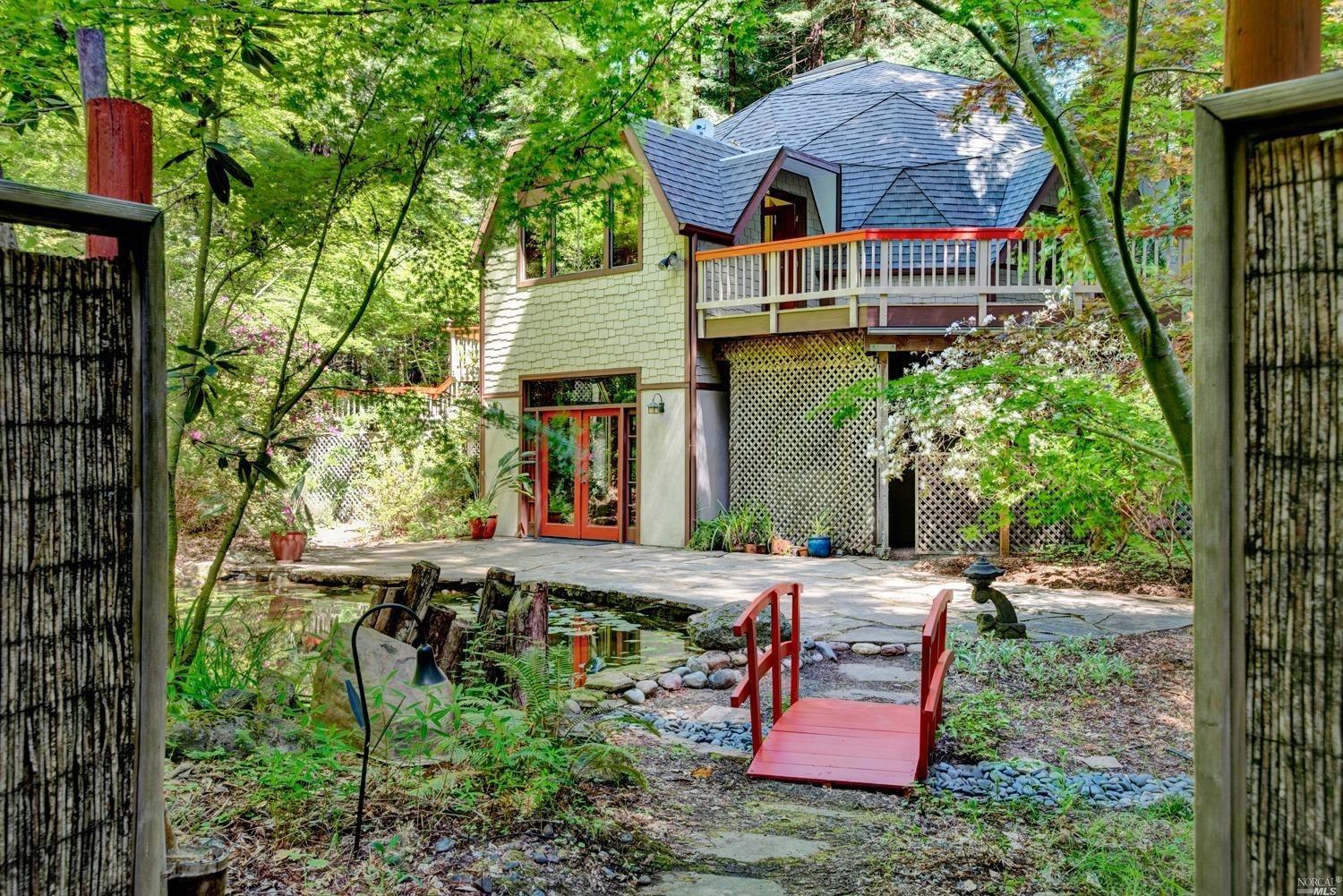 2202 Joy Ridge Road Occidental, CA 95465 - Photo 1 of 1 This is the place of serenity, inspiration and magic. Oriented opposite from driveway and main entrance, this sweet spot has a pond of blue gill and water lilies. Doors lead to lower level family room, primary suite, meditation room and laundry.