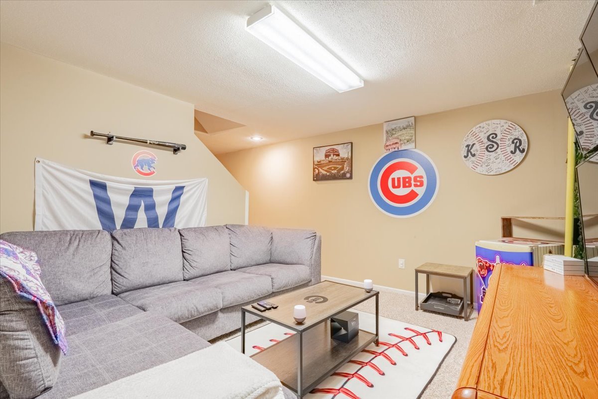3 Downing Circle Bloomington, IL 61704 - Photo 33 of 47 a living room with furniture and a couch