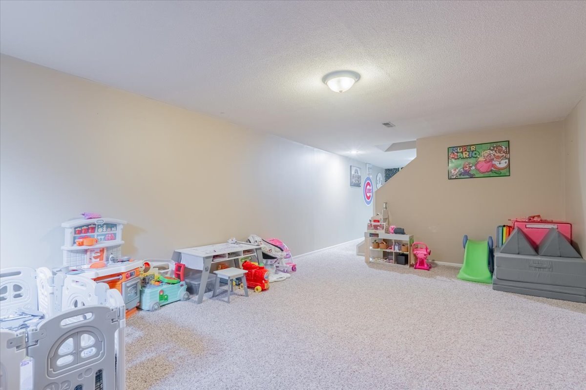 3 Downing Circle Bloomington, IL 61704 - Photo 35 of 47 a view of play room with toys
