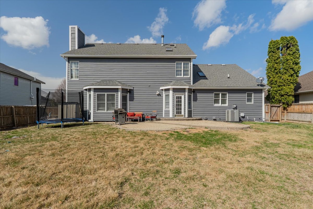 3 Downing Circle Bloomington, IL 61704 - Photo 41 of 47 a front view of a house with a garden