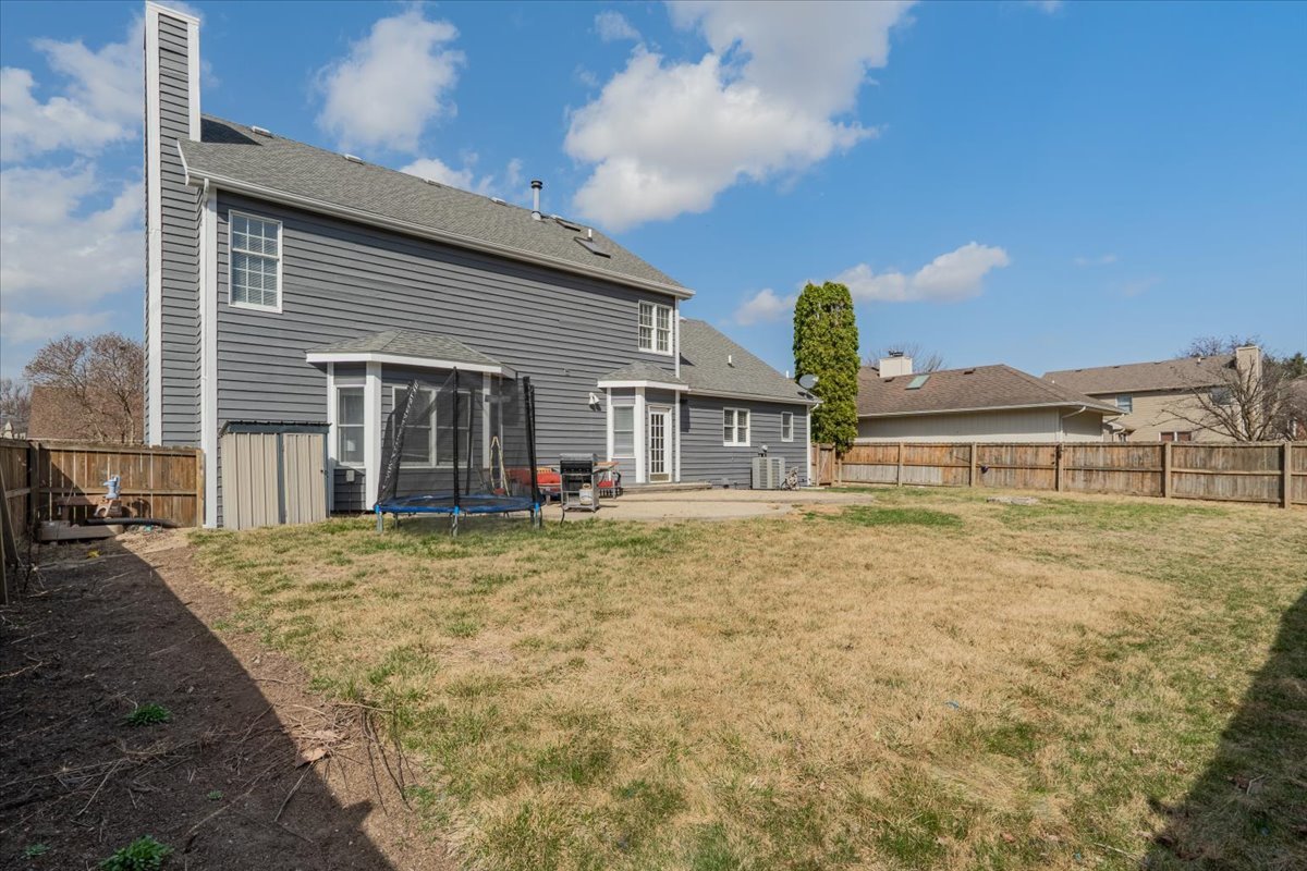 3 Downing Circle Bloomington, IL 61704 - Photo 42 of 47 a view of a house with a backyard