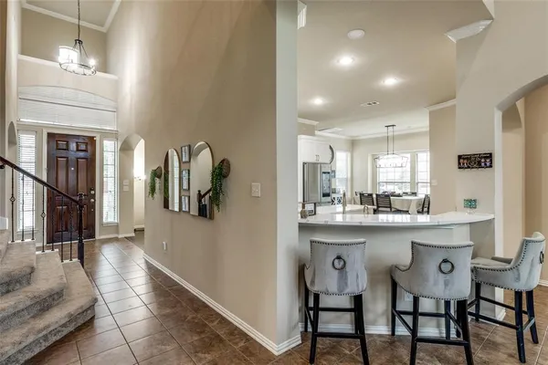 a kitchen with stainless steel appliances granite countertop a sink and cabinets