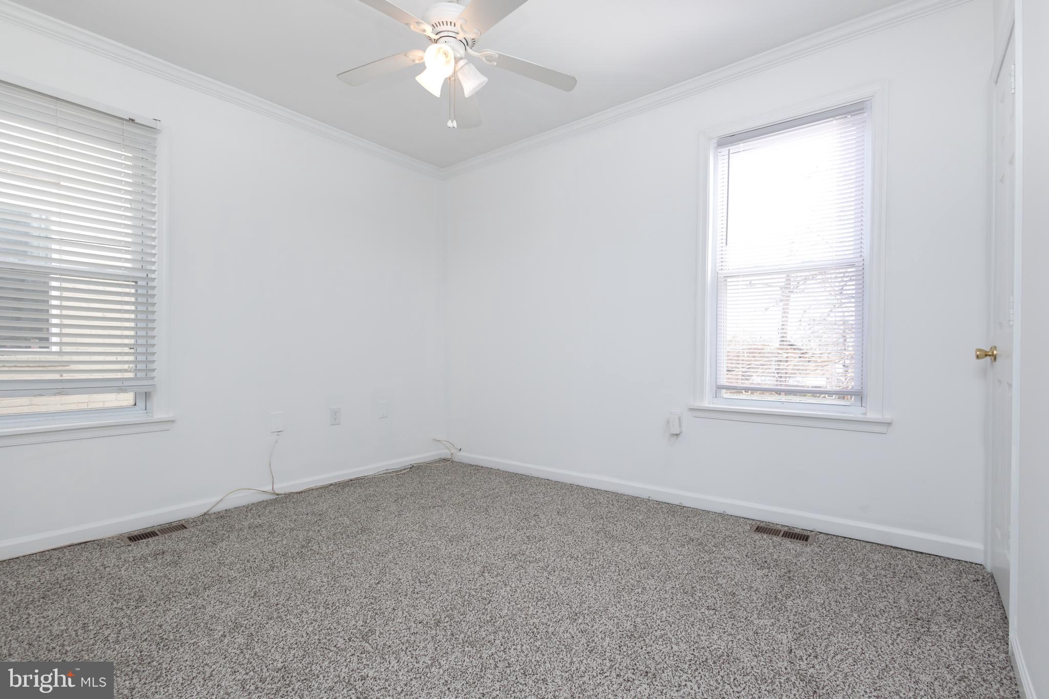 1911 17th Street Southeast Washington, DC 20020 - Photo 20 of 44 an empty room with a window