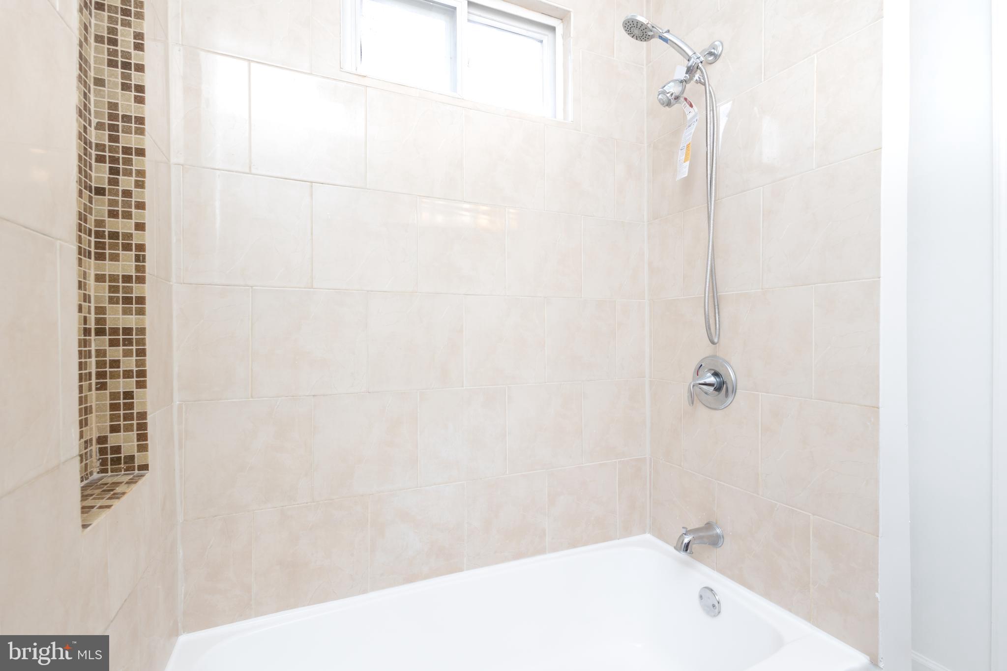 1911 17th Street Southeast Washington, DC 20020 - Photo 29 of 44 a bathroom with a bathtub