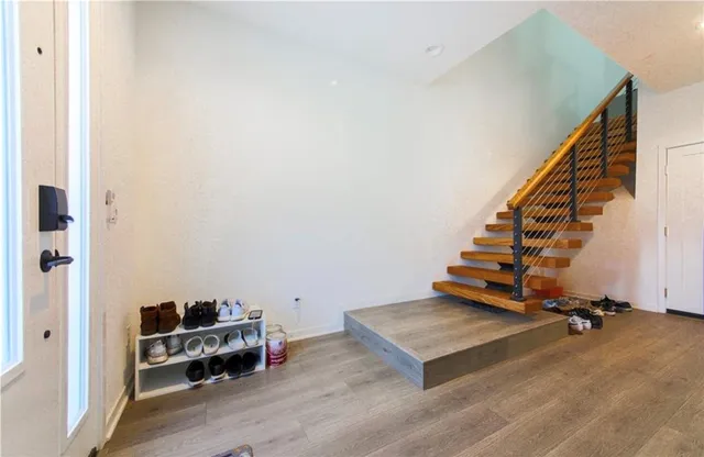a view of a room with toys and stairs