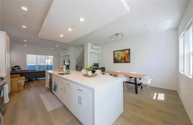 a view of a living room and dining room