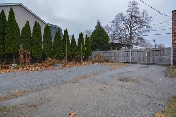 a view of backyard with green space