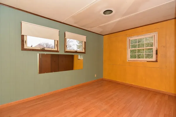 an empty room with windows