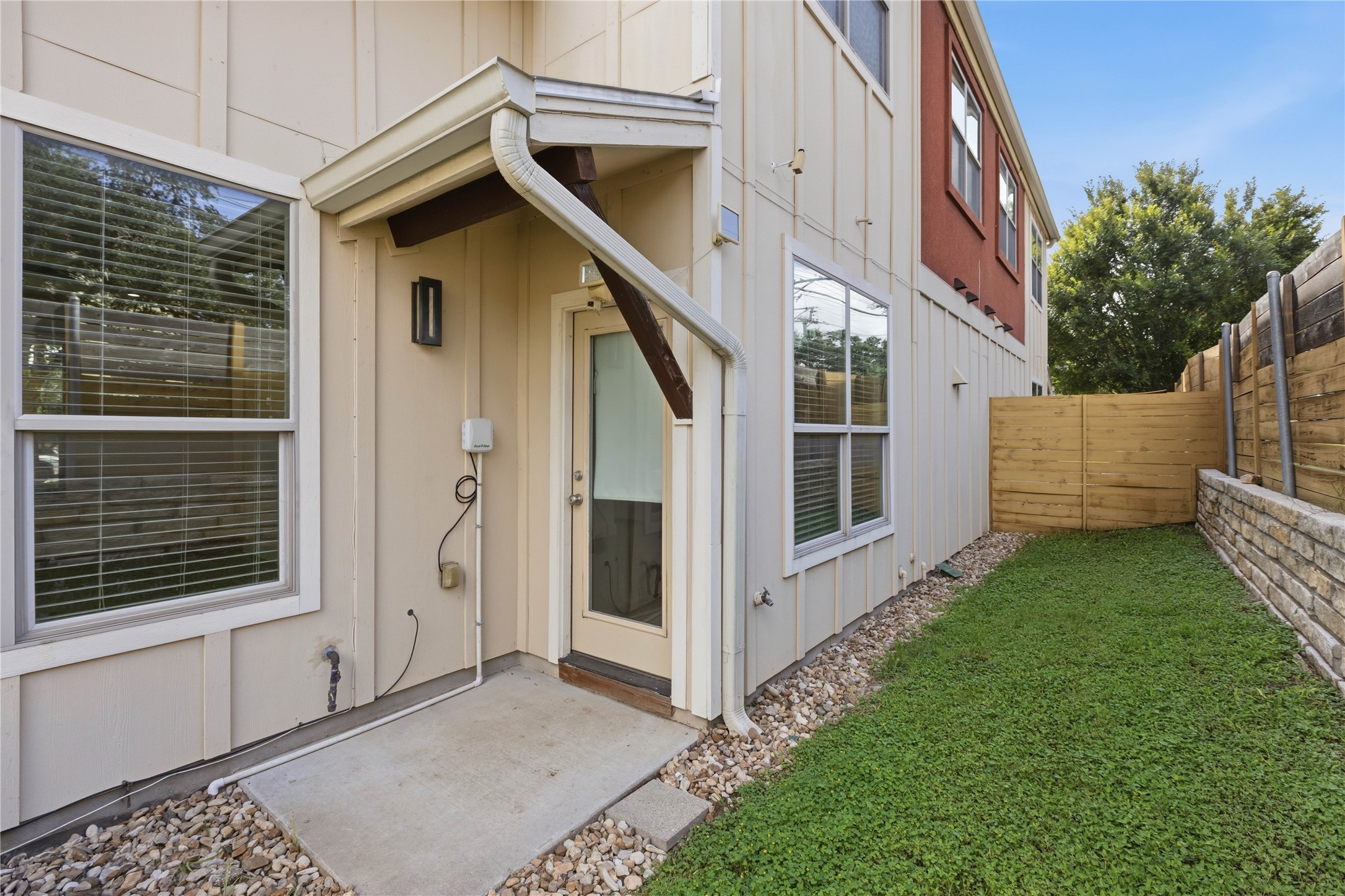 4124 Valley View Road, Unit 4A & 4B Austin, TX 78704 - Photo 12 of 40 A well-maintained side yard offers a private outdoor retreat alongside the building.