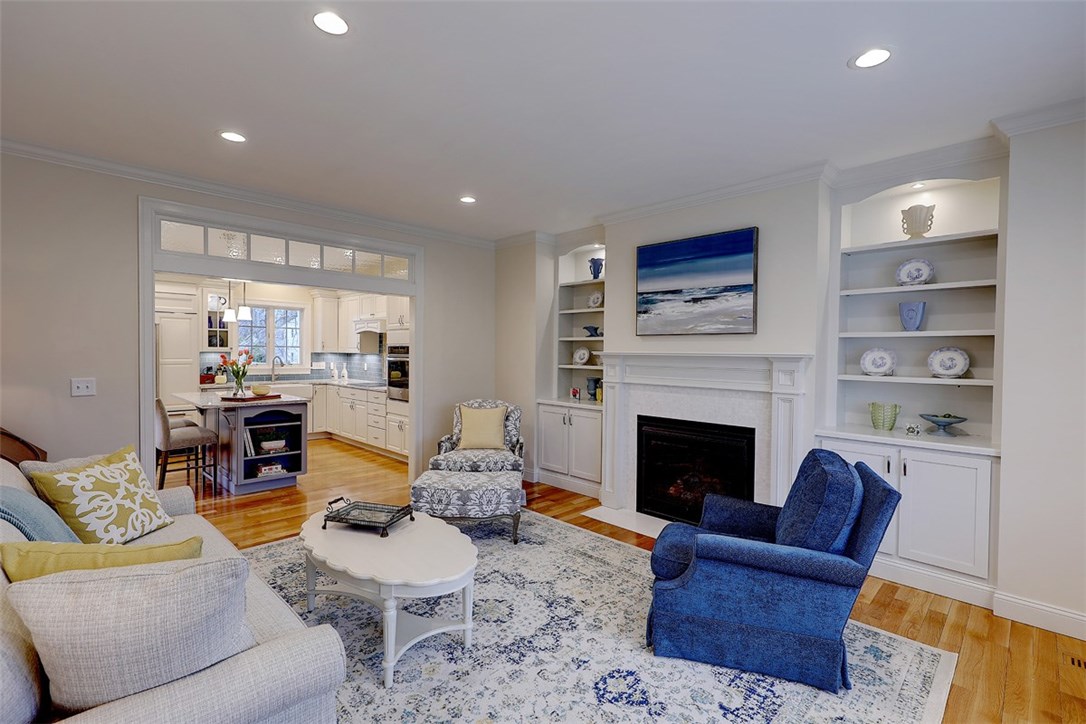 13 Howe Street Bristol, RI 02809 - Photo 13 of 40 Living Room with Fireplace and Flanking Shelves