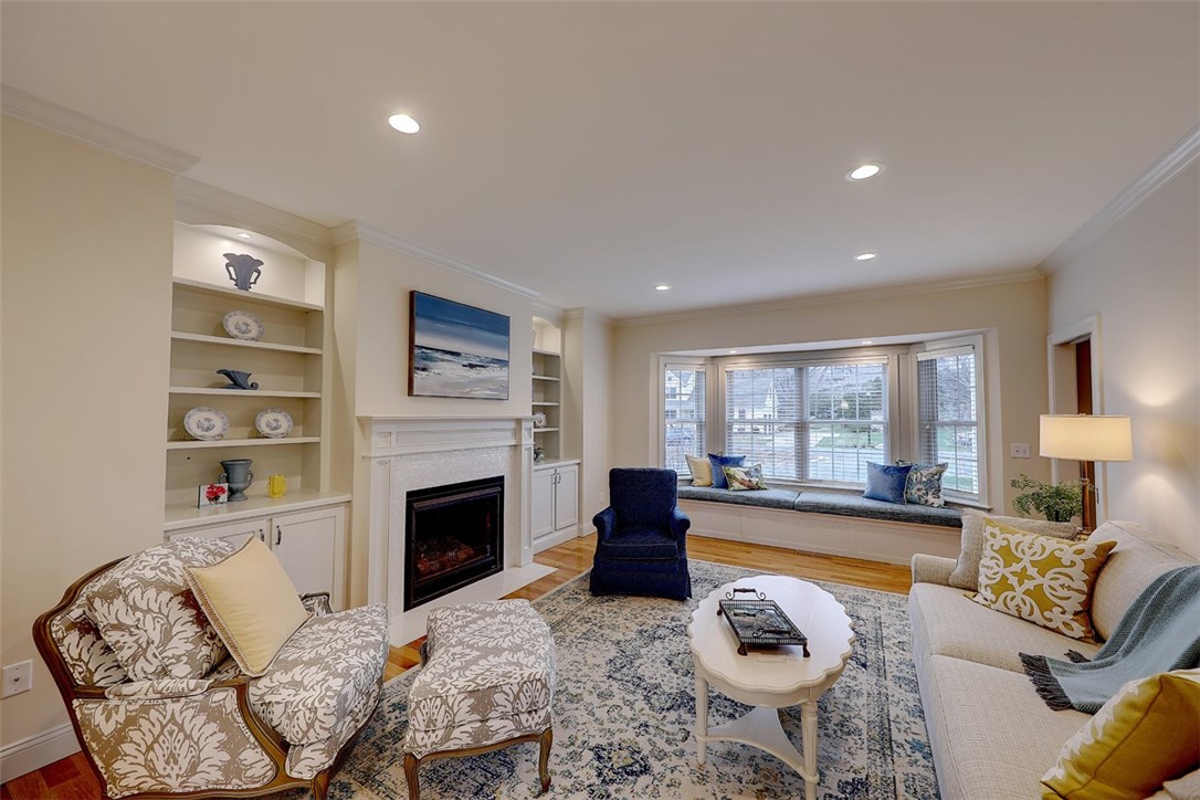 13 Howe Street Bristol, RI 02809 - Photo 14 of 40 Living Room with Fireplace and Window Seat