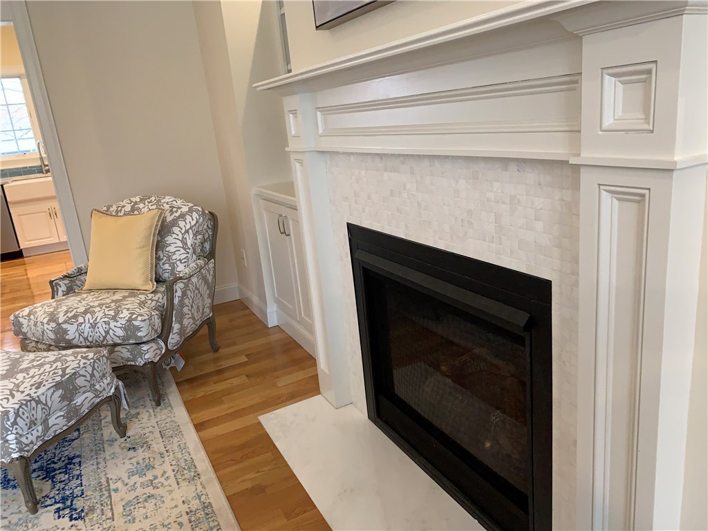 13 Howe Street Bristol, RI 02809 - Photo 15 of 40 Fireplace with Mother-of-Pearl Tiles