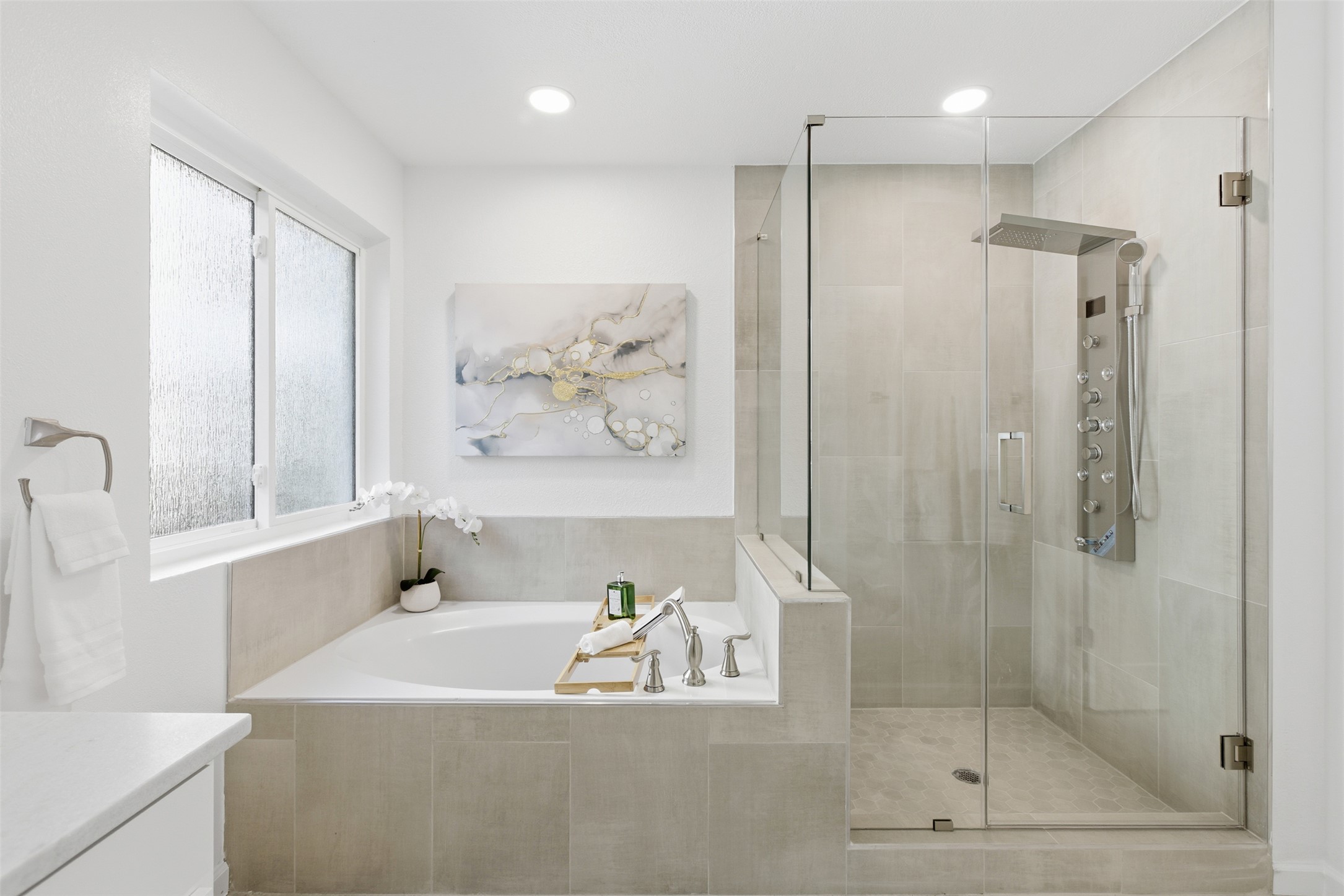 10902 Wareham Court Austin, TX 78739 - Photo 20 of 37 Bathroom featuring a garden tub, a stall shower, recessed lighting, and vanity