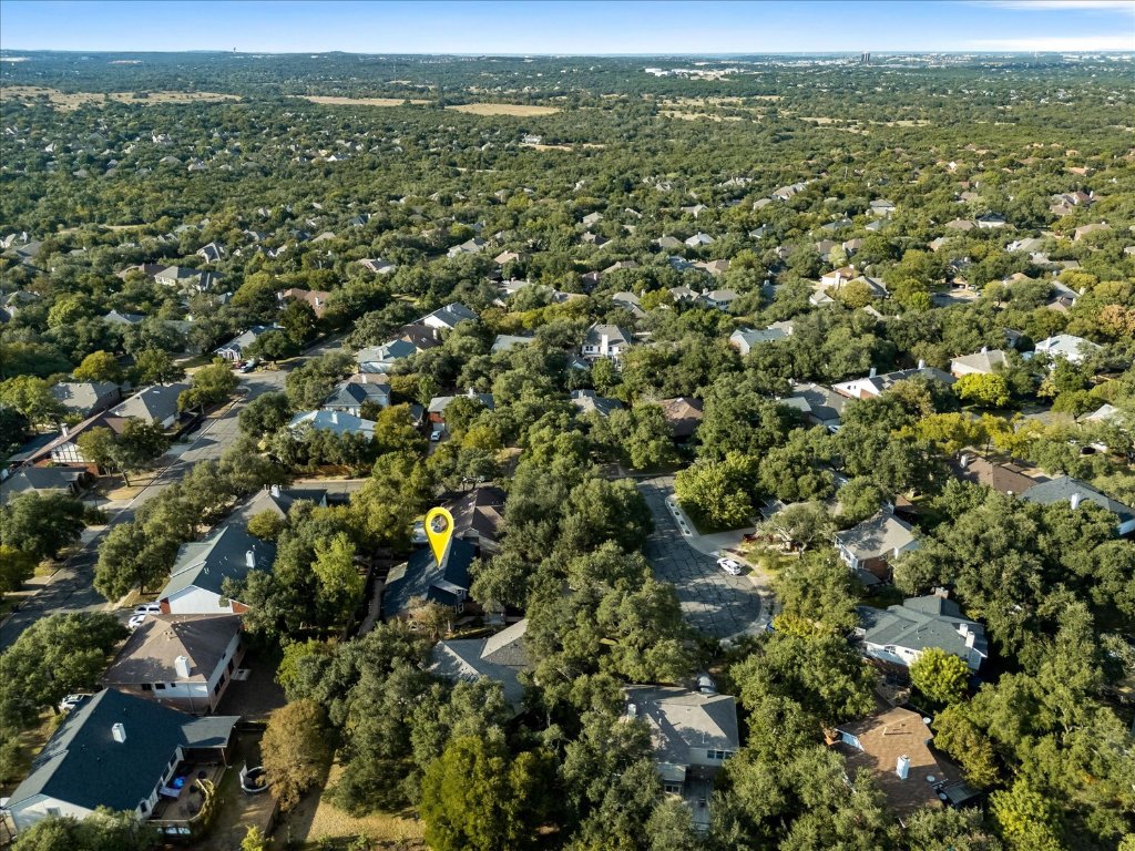 10902 Wareham Court Austin, TX 78739 - Photo 36 of 37 an aerial view of residential houses with outdoor space and trees