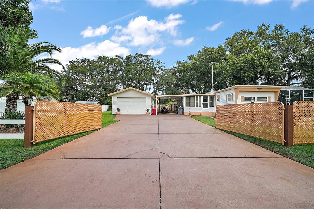 9935 Southeast 168th Place Summerfield, FL 34491 - Photo 12 of 25 a view of house along with street