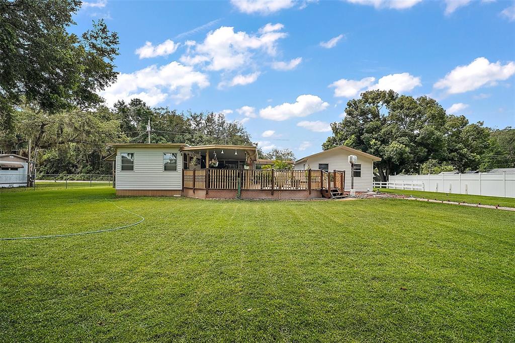 9935 Southeast 168th Place Summerfield, FL 34491 - Photo 13 of 25 a house view with outdoor space and garden
