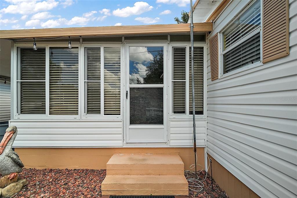 9935 Southeast 168th Place Summerfield, FL 34491 - Photo 2 of 25 a view of entrance door of the house