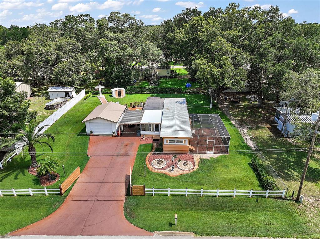 9935 Southeast 168th Place Summerfield, FL 34491 - Photo 9 of 25 an aerial view of a house with outdoor space