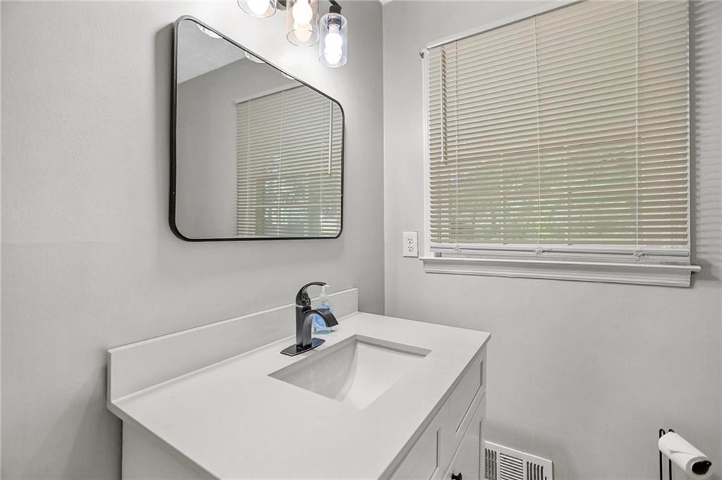 20 Carriage Trace Stockbridge, GA 30281 - Photo 23 of 35 a bathroom with a sink and a vanity