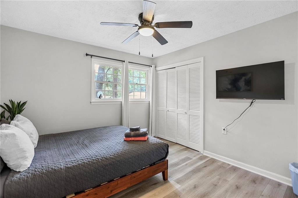 20 Carriage Trace Stockbridge, GA 30281 - Photo 25 of 35 a living room with furniture and a flat screen tv