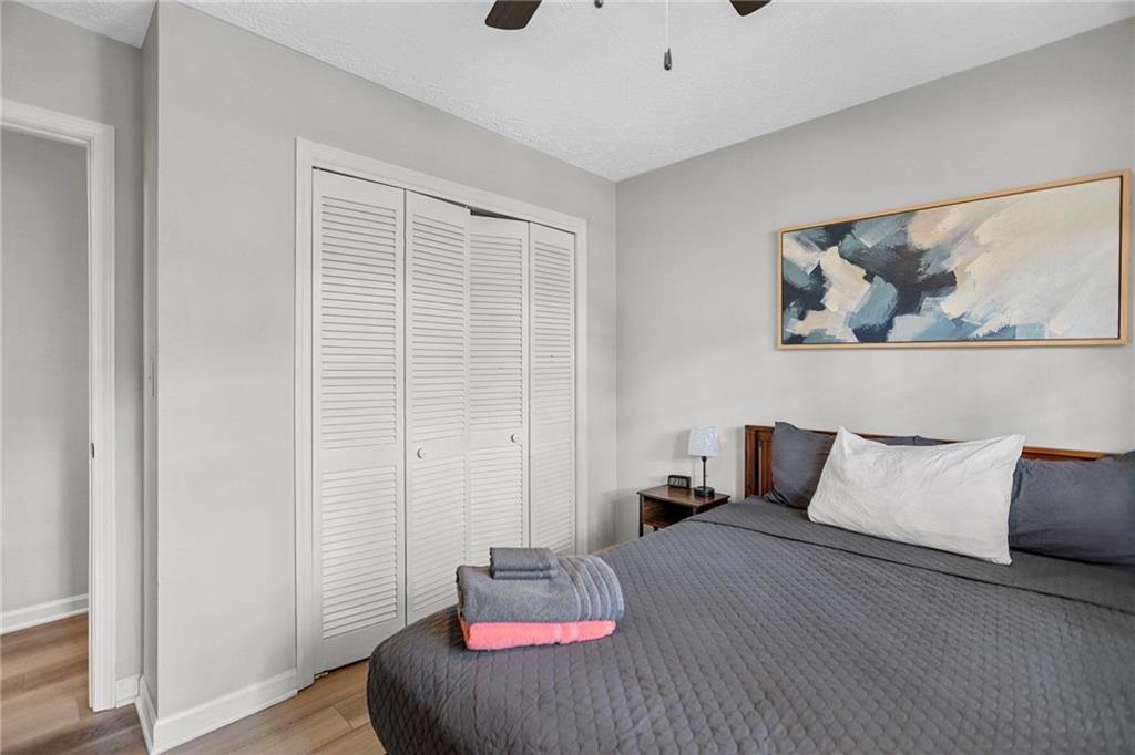 20 Carriage Trace Stockbridge, GA 30281 - Photo 28 of 35 a bedroom with a bed and painting on the wall